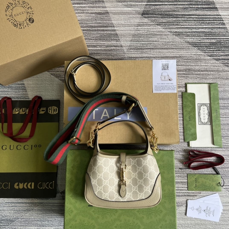 G*u*i top handle bags